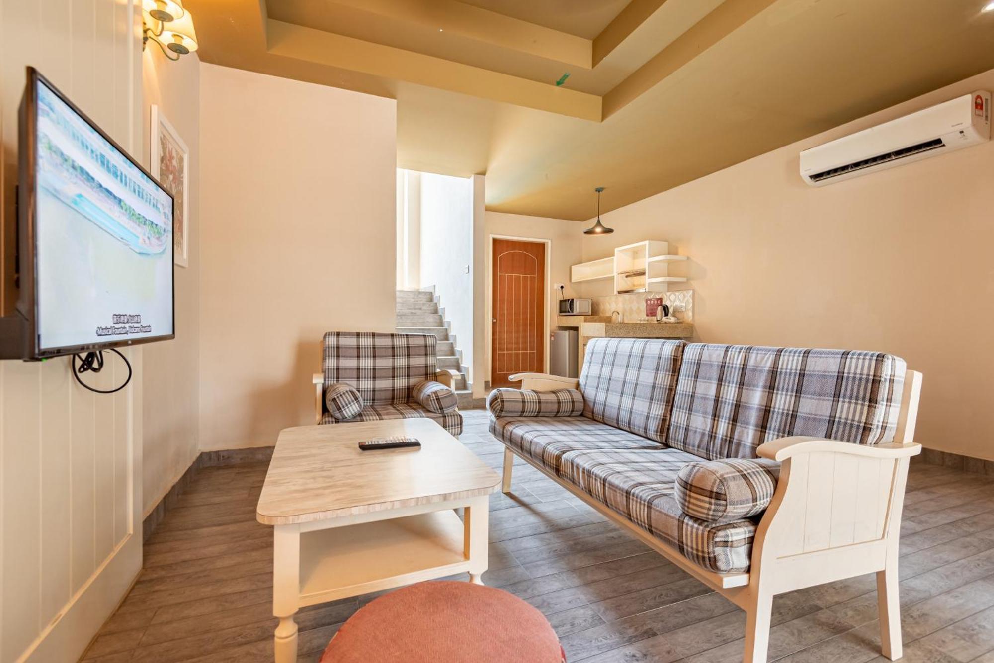 Tasik Villa International Resort Port Dickson Extérieur photo A living room in a serviced apartment in Beijing, China